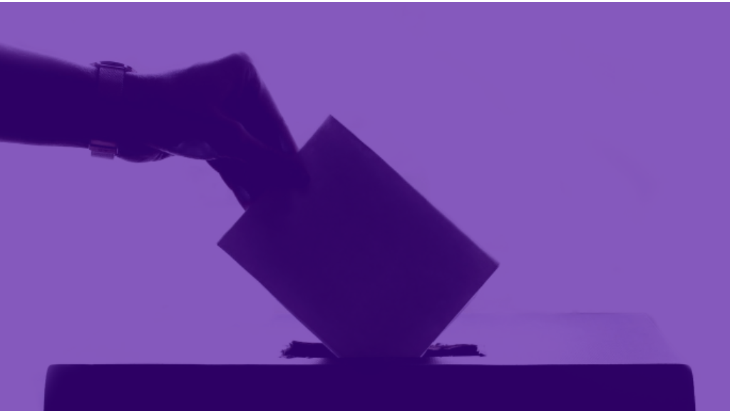 A hand putting a voting paper into a voting box. With a purple background