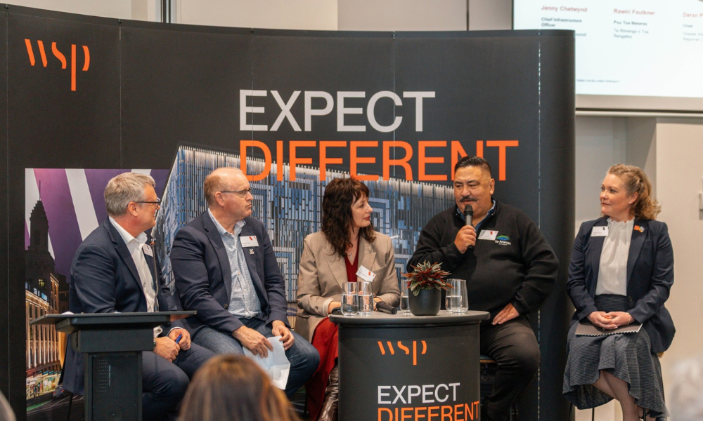 The WSP team sit on a panel on a stage